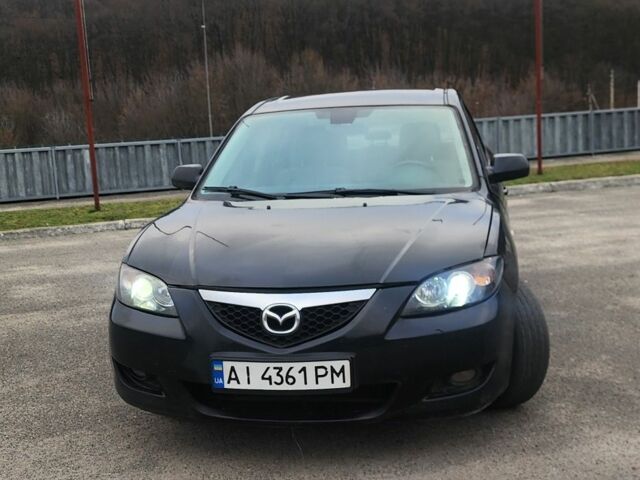 Черный Мазда 3, объемом двигателя 1.6 л и пробегом 300 тыс. км за 3700 $, фото 1 на Automoto.ua