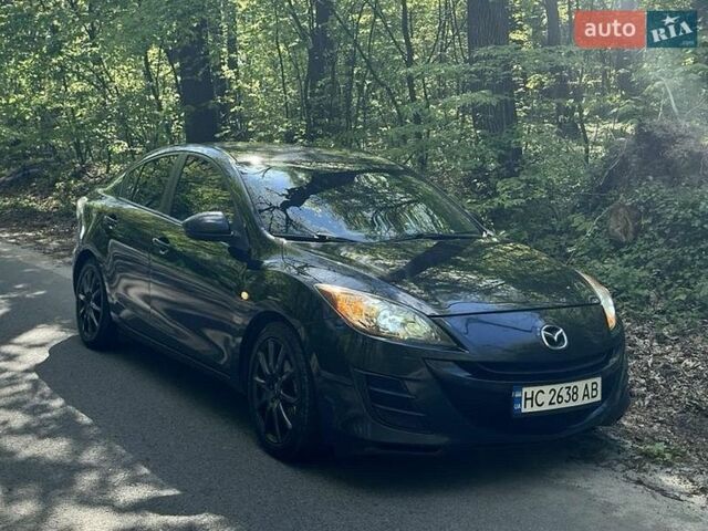 Черный Мазда 3, объемом двигателя 1.56 л и пробегом 227 тыс. км за 6200 $, фото 1 на Automoto.ua
