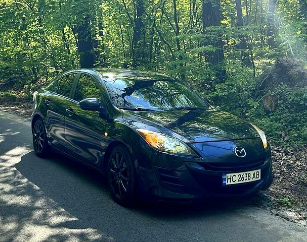 Черный Мазда 3, объемом двигателя 1.6 л и пробегом 227 тыс. км за 6000 $, фото 1 на Automoto.ua