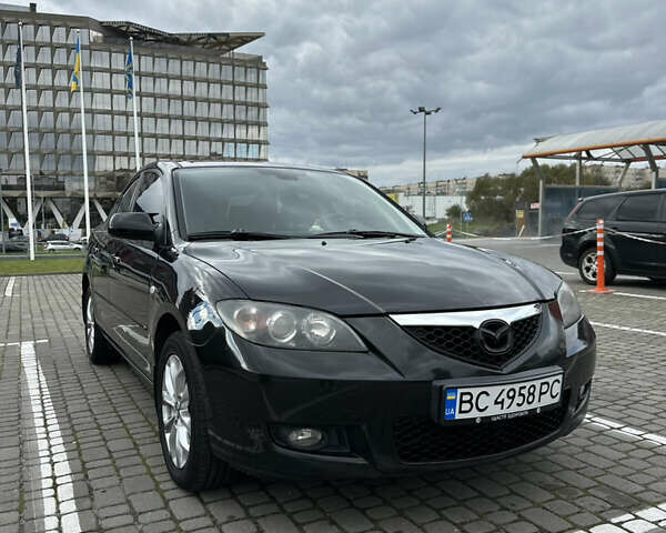Черный Мазда 3, объемом двигателя 1.6 л и пробегом 262 тыс. км за 5500 $, фото 1 на Automoto.ua