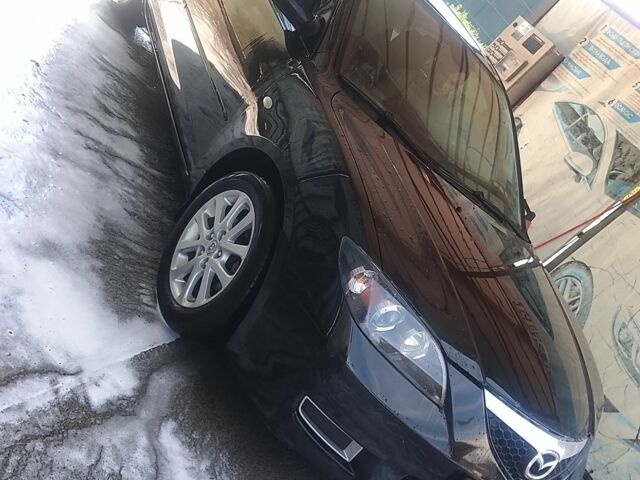 Чорний Мазда 3, об'ємом двигуна 1.6 л та пробігом 185 тис. км за 4100 $, фото 1 на Automoto.ua