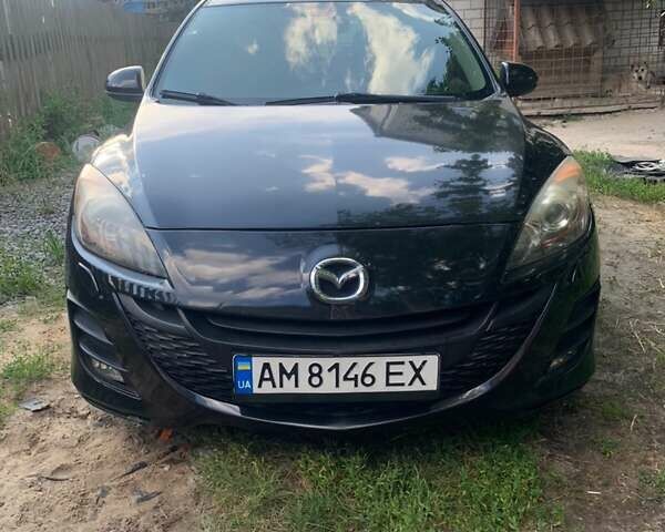 Черный Мазда 3, объемом двигателя 2 л и пробегом 165 тыс. км за 6500 $, фото 1 на Automoto.ua
