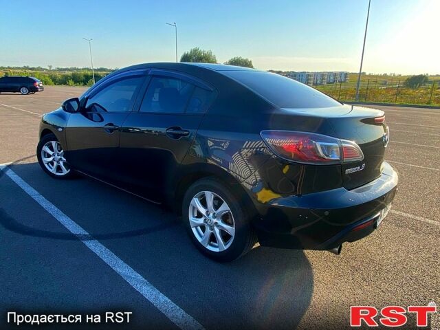 Чорний Мазда 3, об'ємом двигуна 2 л та пробігом 261 тис. км за 6900 $, фото 1 на Automoto.ua