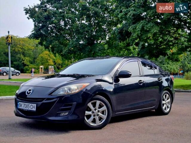Черный Мазда 3, объемом двигателя 2 л и пробегом 258 тыс. км за 7100 $, фото 1 на Automoto.ua