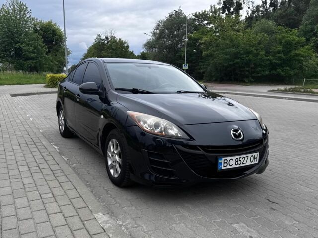 Чорний Мазда 3, об'ємом двигуна 1.6 л та пробігом 183 тис. км за 6312 $, фото 1 на Automoto.ua