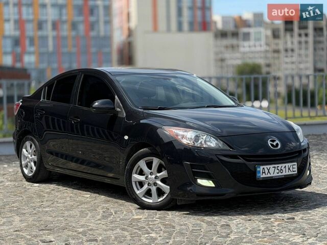 Черный Мазда 3, объемом двигателя 2 л и пробегом 219 тыс. км за 7650 $, фото 1 на Automoto.ua
