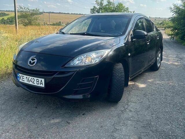 Чорний Мазда 3, об'ємом двигуна 1.6 л та пробігом 210 тис. км за 6728 $, фото 1 на Automoto.ua