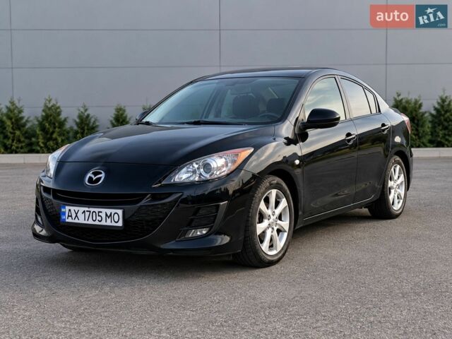 Чорний Мазда 3, об'ємом двигуна 1.6 л та пробігом 210 тис. км за 6500 $, фото 1 на Automoto.ua