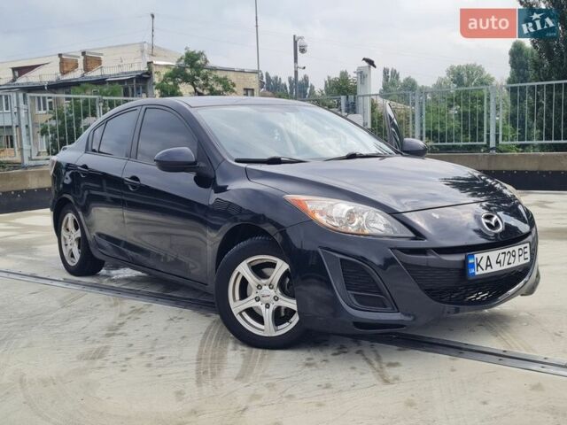 Черный Мазда 3, объемом двигателя 2 л и пробегом 302 тыс. км за 5999 $, фото 1 на Automoto.ua