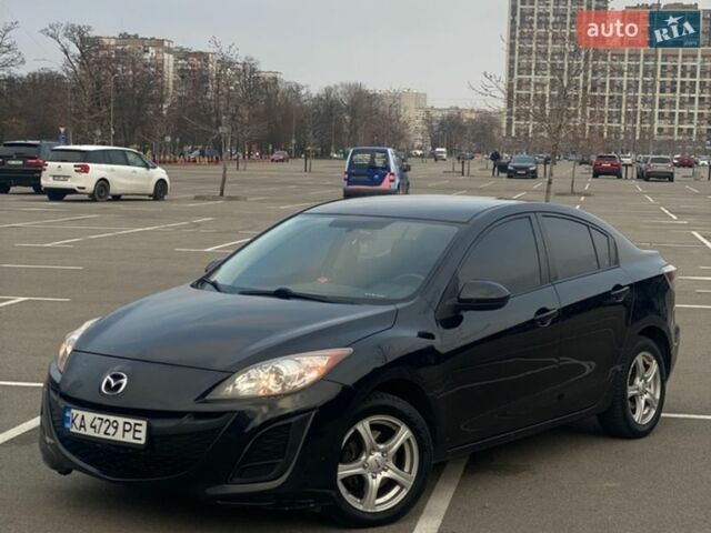 Черный Мазда 3, объемом двигателя 2 л и пробегом 250 тыс. км за 6950 $, фото 1 на Automoto.ua