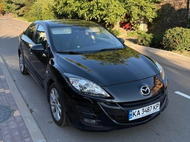 Чорний Мазда 3, об'ємом двигуна 1.6 л та пробігом 150 тис. км за 6702 $, фото 1 на Automoto.ua