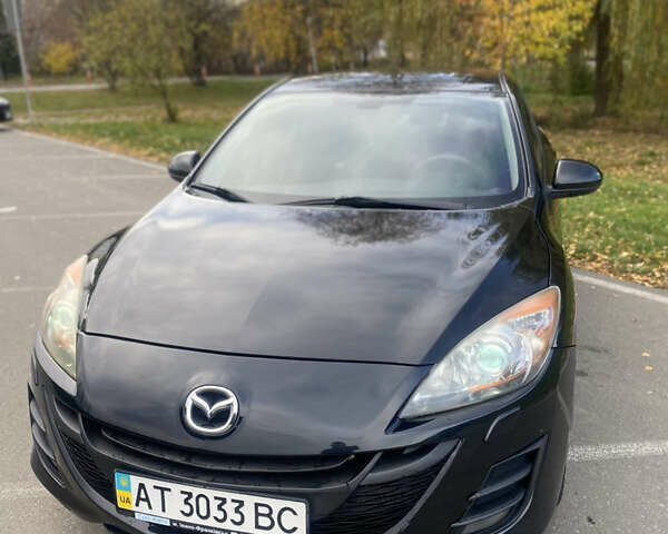 Черный Мазда 3, объемом двигателя 1.6 л и пробегом 255 тыс. км за 7850 $, фото 1 на Automoto.ua