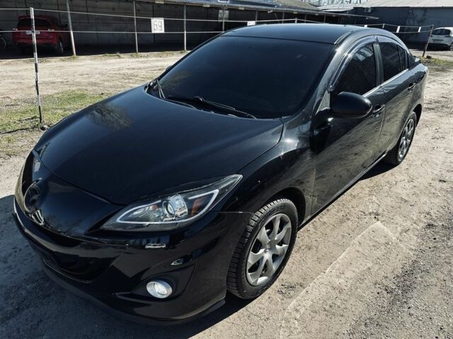 Черный Мазда 3, объемом двигателя 2 л и пробегом 174 тыс. км за 6500 $, фото 1 на Automoto.ua