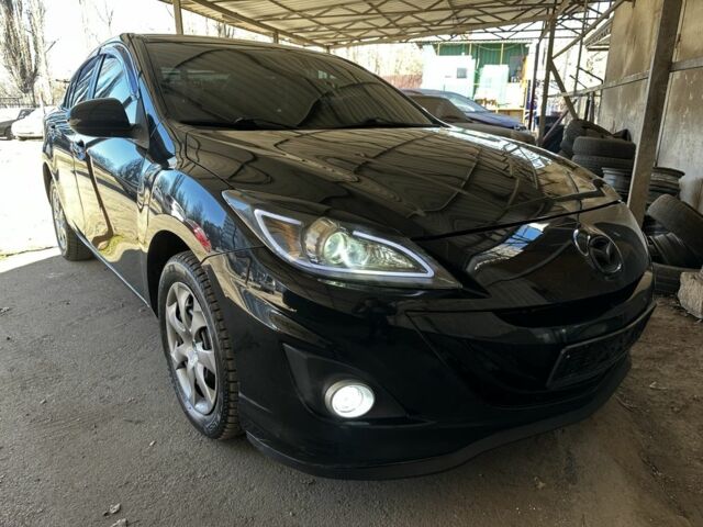 Черный Мазда 3, объемом двигателя 2 л и пробегом 174 тыс. км за 6500 $, фото 1 на Automoto.ua
