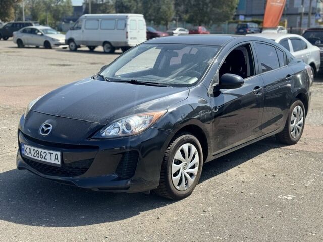 Черный Мазда 3, объемом двигателя 2 л и пробегом 192 тыс. км за 5693 $, фото 1 на Automoto.ua