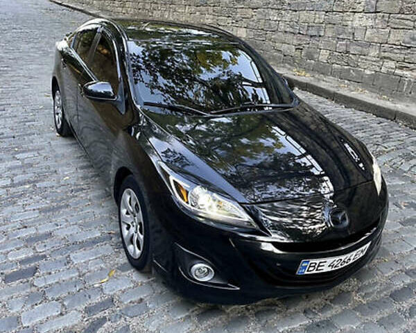 Черный Мазда 3, объемом двигателя 2 л и пробегом 280 тыс. км за 7000 $, фото 1 на Automoto.ua