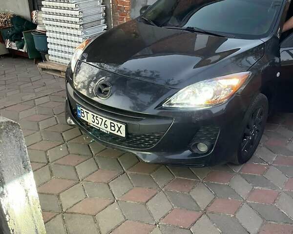Черный Мазда 3, объемом двигателя 1.6 л и пробегом 180 тыс. км за 6300 $, фото 1 на Automoto.ua