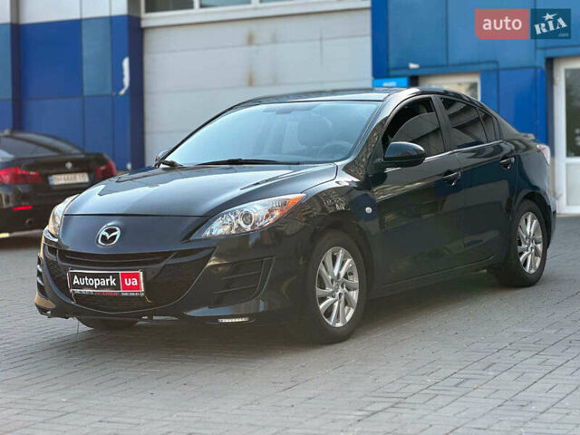 Черный Мазда 3, объемом двигателя 2 л и пробегом 240 тыс. км за 7690 $, фото 1 на Automoto.ua