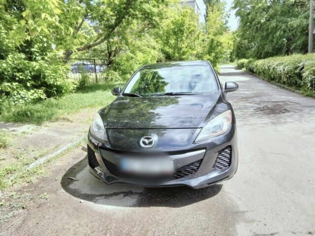 Черный Мазда 3, объемом двигателя 2 л и пробегом 220 тыс. км за 7200 $, фото 1 на Automoto.ua
