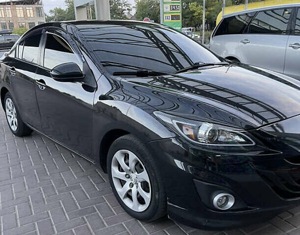 Черный Мазда 3, объемом двигателя 2 л и пробегом 284 тыс. км за 6950 $, фото 1 на Automoto.ua