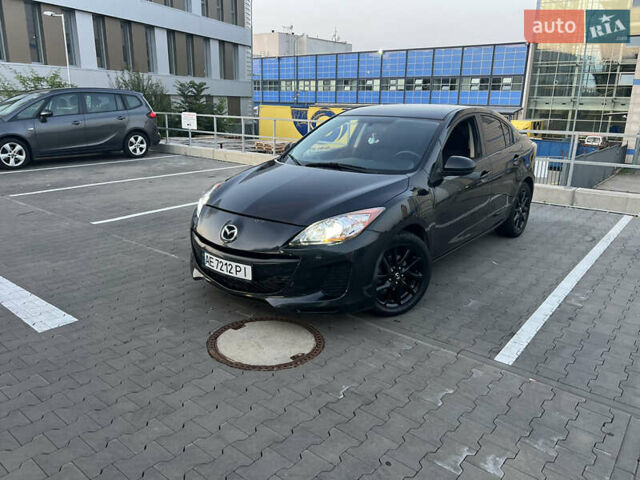 Черный Мазда 3, объемом двигателя 2 л и пробегом 235 тыс. км за 7400 $, фото 1 на Automoto.ua
