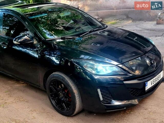 Черный Мазда 3, объемом двигателя 2 л и пробегом 189 тыс. км за 6500 $, фото 1 на Automoto.ua