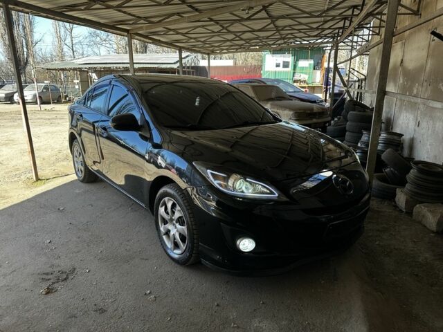 Черный Мазда 3, объемом двигателя 2 л и пробегом 178 тыс. км за 6950 $, фото 1 на Automoto.ua