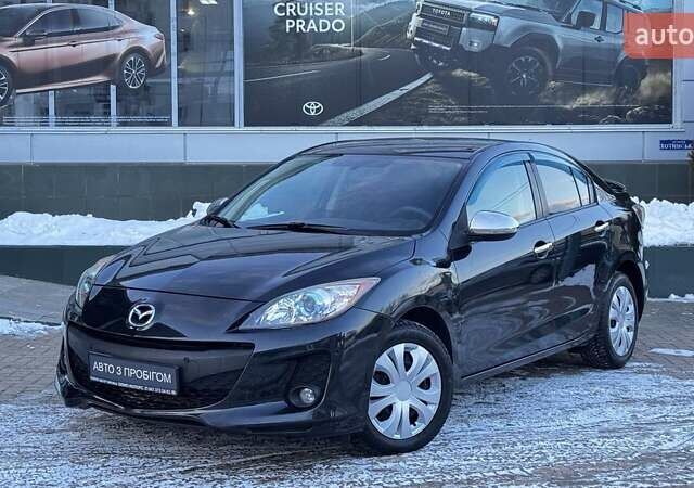 Черный Мазда 3, объемом двигателя 2 л и пробегом 270 тыс. км за 7512 $, фото 1 на Automoto.ua