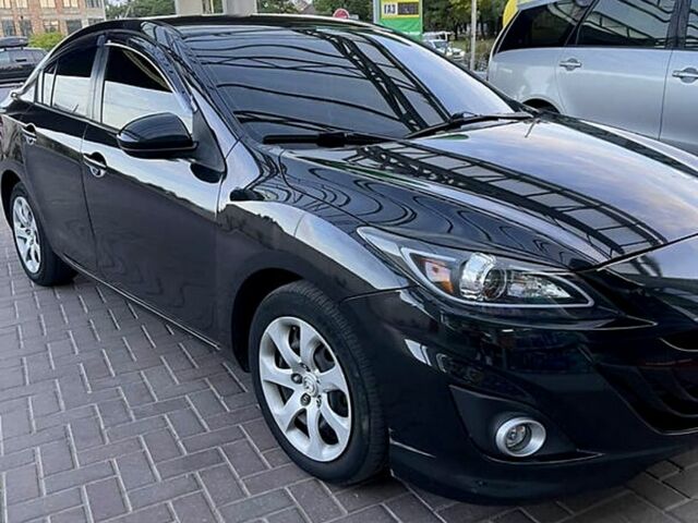 Черный Мазда 3, объемом двигателя 2 л и пробегом 178 тыс. км за 6300 $, фото 1 на Automoto.ua