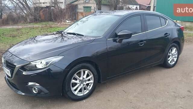 Черный Мазда 3, объемом двигателя 1.5 л и пробегом 88 тыс. км за 14700 $, фото 1 на Automoto.ua