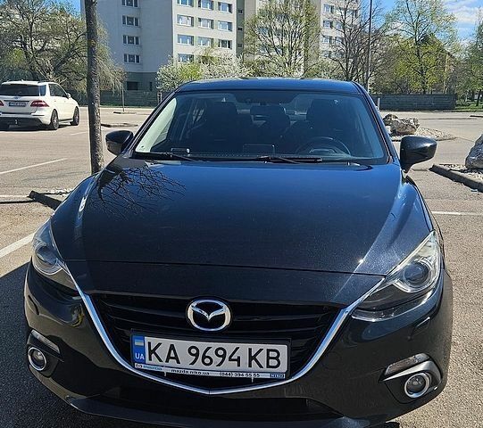 Черный Мазда 3, объемом двигателя 1.5 л и пробегом 101 тыс. км за 11700 $, фото 1 на Automoto.ua