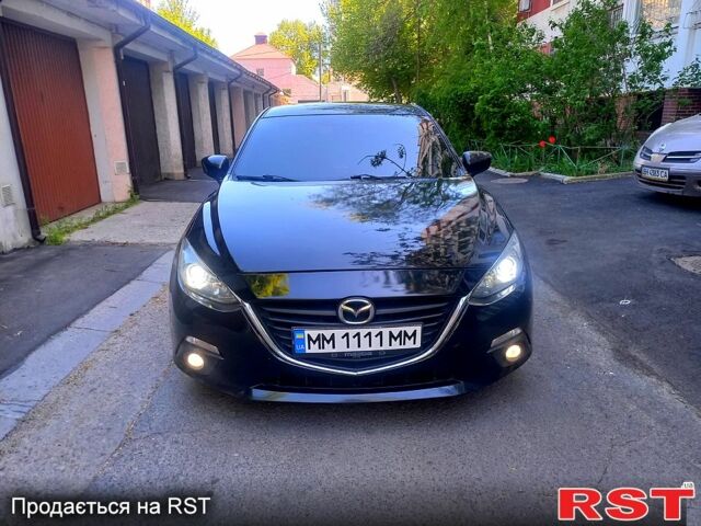 Черный Мазда 3, объемом двигателя 2 л и пробегом 167 тыс. км за 11800 $, фото 1 на Automoto.ua