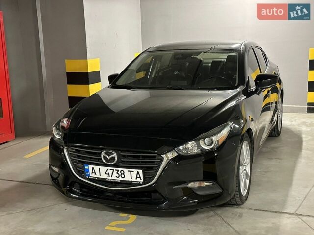 Черный Мазда 3, объемом двигателя 2 л и пробегом 187 тыс. км за 9699 $, фото 1 на Automoto.ua