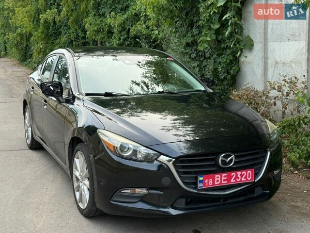 Черный Мазда 3, объемом двигателя 2 л и пробегом 133 тыс. км за 8900 $, фото 1 на Automoto.ua