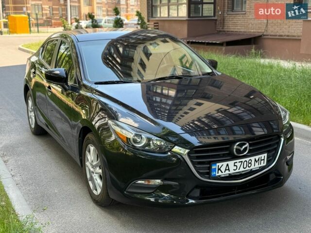 Черный Мазда 3, объемом двигателя 2 л и пробегом 125 тыс. км за 11900 $, фото 1 на Automoto.ua