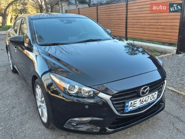Черный Мазда 3, объемом двигателя 2 л и пробегом 113 тыс. км за 12800 $, фото 1 на Automoto.ua