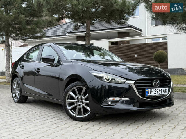 Черный Мазда 3, объемом двигателя 2.49 л и пробегом 99 тыс. км за 13900 $, фото 1 на Automoto.ua