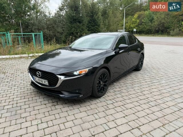 Черный Мазда 3, объемом двигателя 2 л и пробегом 97 тыс. км за 12500 $, фото 1 на Automoto.ua