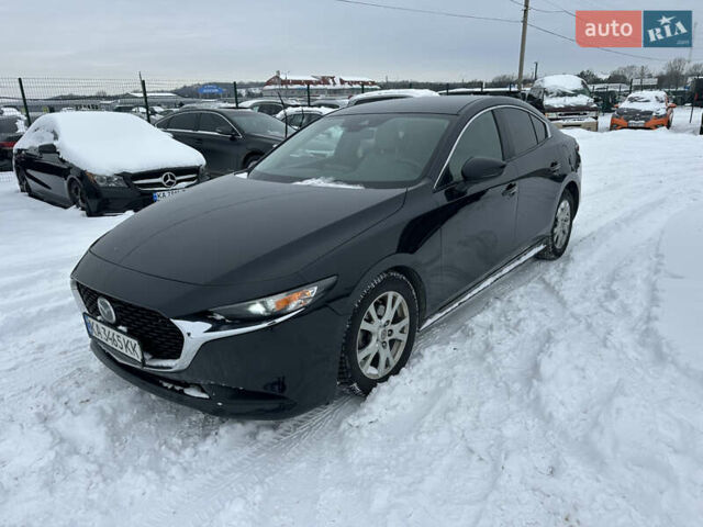 Черный Мазда 3, объемом двигателя 2.49 л и пробегом 122 тыс. км за 15600 $, фото 1 на Automoto.ua