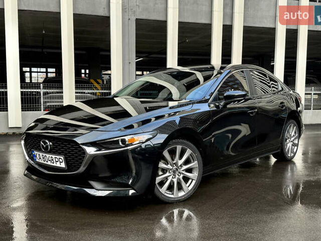 Черный Мазда 3, объемом двигателя 2.49 л и пробегом 65 тыс. км за 16550 $, фото 1 на Automoto.ua