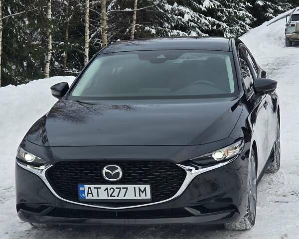 Черный Мазда 3, объемом двигателя 2.49 л и пробегом 62 тыс. км за 15700 $, фото 1 на Automoto.ua