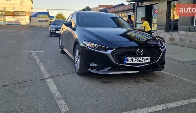 Черный Мазда 3, объемом двигателя 2.49 л и пробегом 40 тыс. км за 17500 $, фото 1 на Automoto.ua