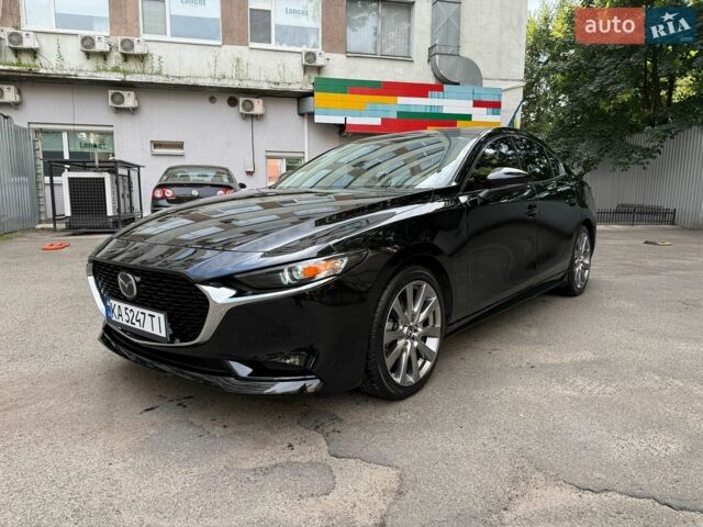Черный Мазда 3, объемом двигателя 2.49 л и пробегом 97 тыс. км за 16800 $, фото 1 на Automoto.ua