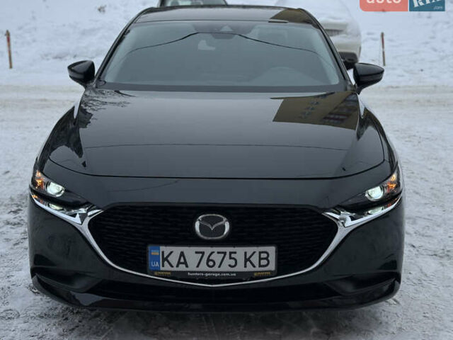 Чорний Мазда 3, об'ємом двигуна 2.49 л та пробігом 23 тис. км за 18500 $, фото 1 на Automoto.ua