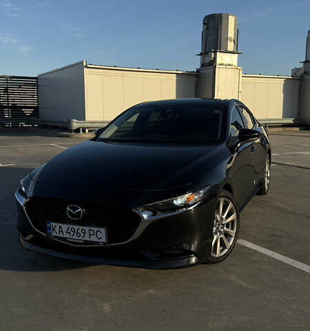 Черный Мазда 3, объемом двигателя 2.49 л и пробегом 58 тыс. км за 14500 $, фото 1 на Automoto.ua