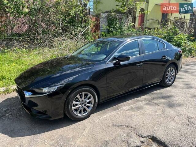 Черный Мазда 3, объемом двигателя 2 л и пробегом 25 тыс. км за 14999 $, фото 1 на Automoto.ua