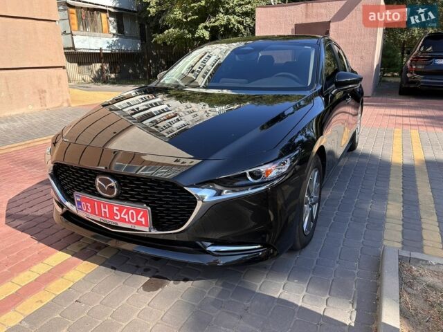 Черный Мазда 3, объемом двигателя 2.49 л и пробегом 43 тыс. км за 16300 $, фото 1 на Automoto.ua