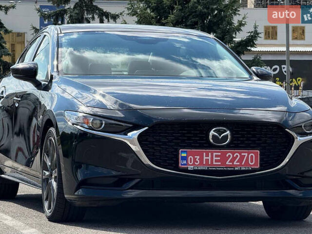 Черный Мазда 3, объемом двигателя 2.49 л и пробегом 23 тыс. км за 20900 $, фото 1 на Automoto.ua