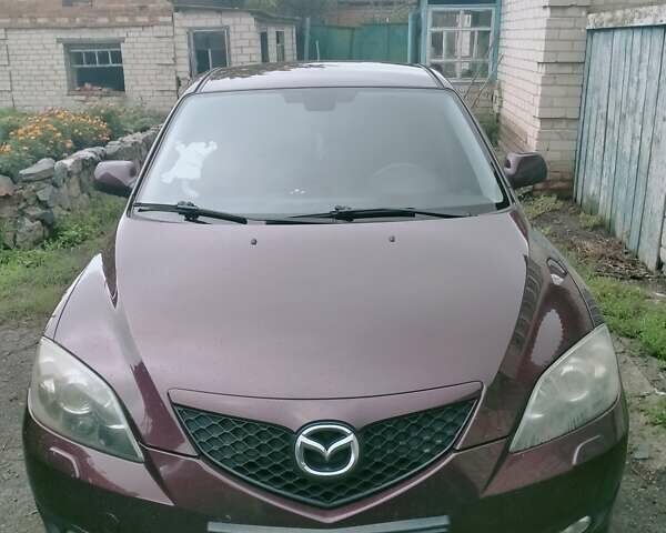 Фіолетовий Мазда 3, об'ємом двигуна 1.6 л та пробігом 210 тис. км за 6100 $, фото 1 на Automoto.ua