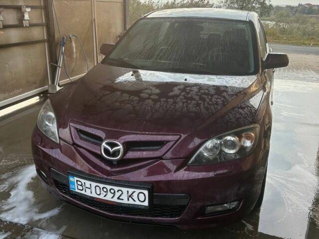 Фиолетовый Мазда 3, объемом двигателя 2 л и пробегом 298 тыс. км за 4864 $, фото 1 на Automoto.ua